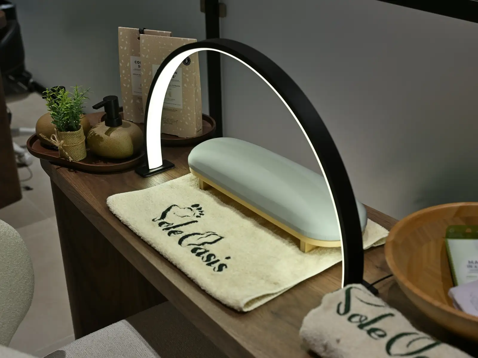 Manicure station with polish wall racks