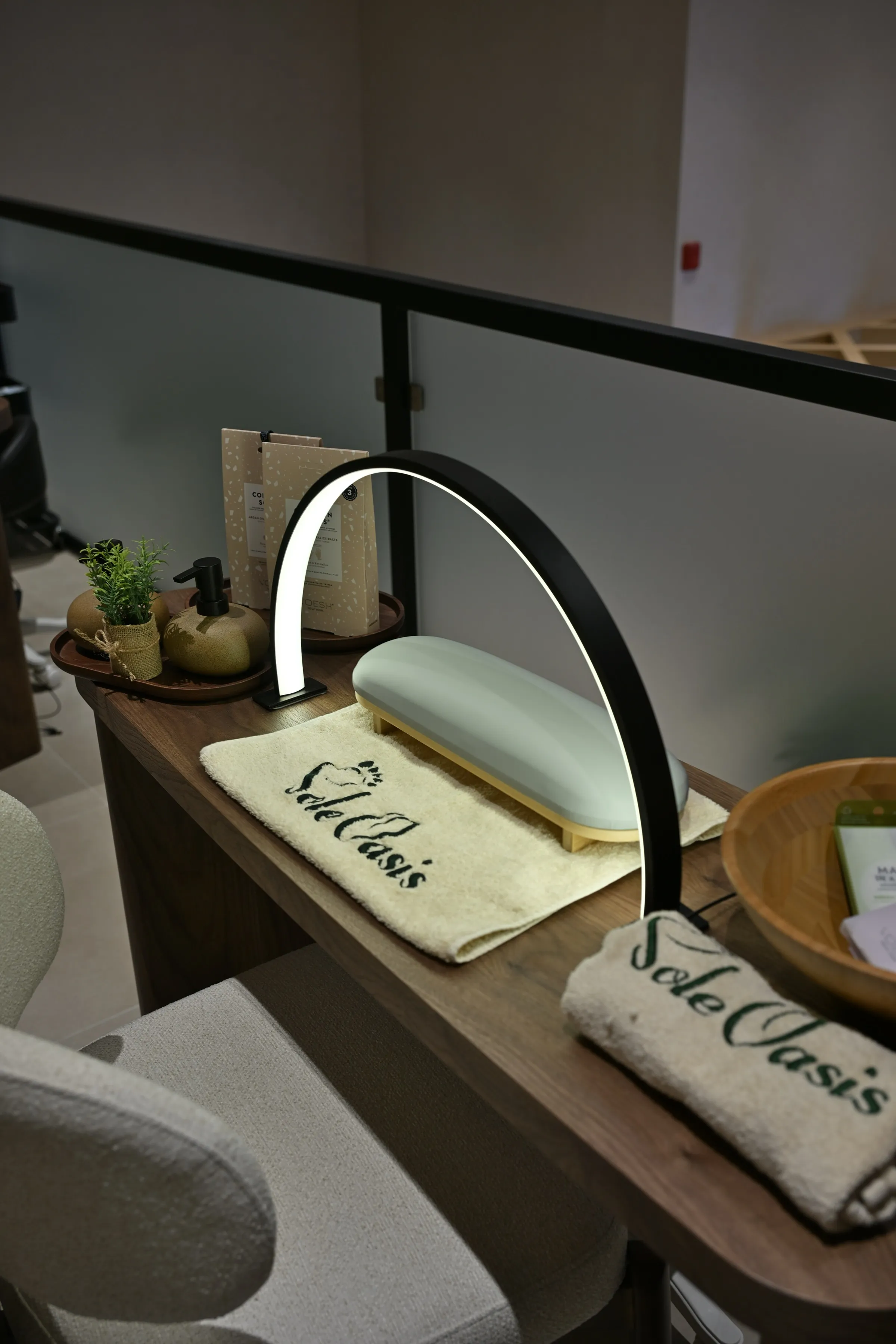 Manicure station with polish wall racks